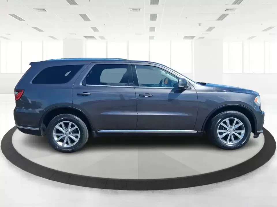 2015 Dodge Durango Limited (1C4RDJDG7FC) with an 3.6L V6 DOHC 24V engine, 8-Speed Automatic transmission, located at 1230 East Main St, Xenia, OH, 45385, (937) 908-9800, 39.688026, -83.910172 - Pack up the kids, load the cargo, and point the nose toward your next weekend getaway-this 2015 Dodge Durango Limited is built for real life in West Central Ohio. Whether you're shuttling a growing family to practice, commuting up I75, or planning a road trip to Indian Lake, the Durango delivers the - Photo#1
