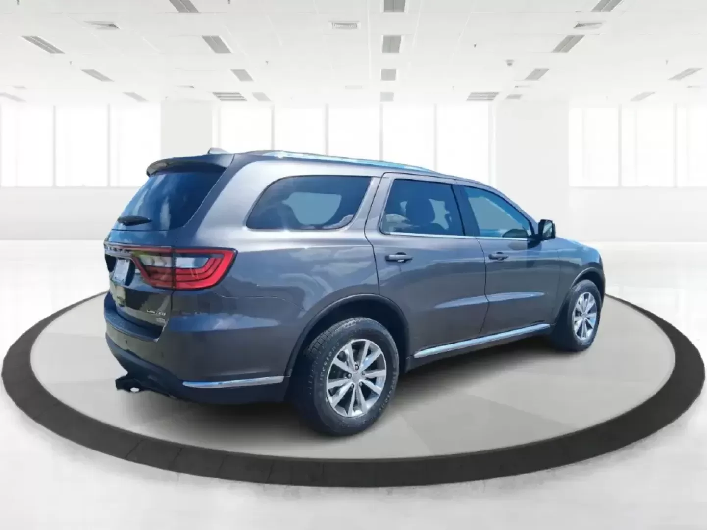 2015 Dodge Durango Limited (1C4RDJDG7FC) with an 3.6L V6 DOHC 24V engine, 8-Speed Automatic transmission, located at 880 E. National Road, Vandalia, OH, 45377, (937) 908-9800, 39.891918, -84.183594 - Pack up the kids, load the cargo, and point the nose toward your next weekend getaway-this 2015 Dodge Durango Limited is built for real life in West Central Ohio. Whether you're shuttling a growing family to practice, commuting up I75, or planning a road trip to Indian Lake, the Durango delivers the - Photo#2