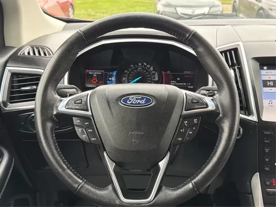 2018 Ford Edge Titanium (2FMPK4K82JB) with an 3.5L V6 DOHC 24V engine, 6A transmission, located at 1951 S Dayton Lakeview Rd., New Carlisle, OH, 45344, (937) 908-9800, 39.890999, -84.050255 - Need one SUV that can handle Ohio weather, keep the family comfortable, and still feel upscale for your daily commute? This 2018 Ford Edge Titanium in Shadow Black is built for real life-school runs, I-75 commuting, and weekend getaways to places like Charleston Falls Preserve-while giving you the p - Photo#16