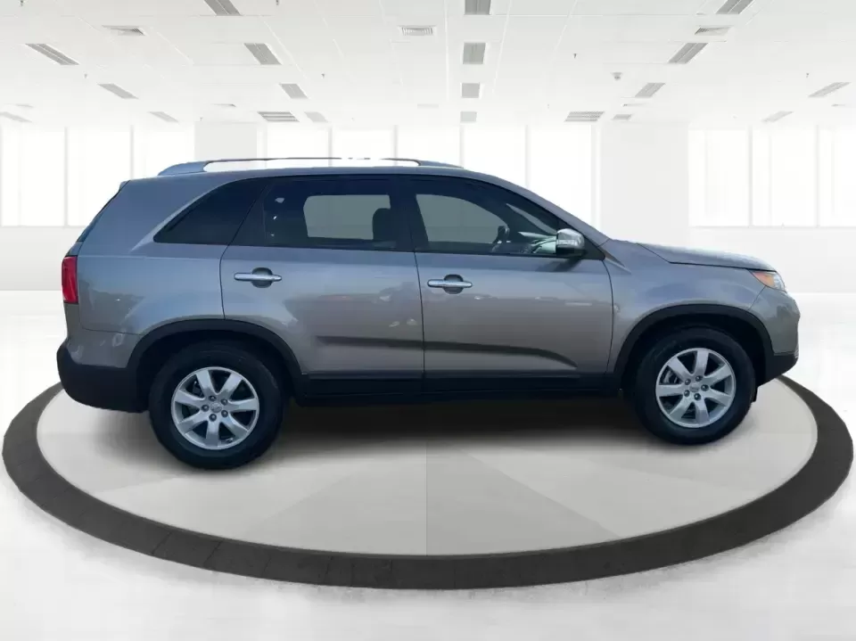 2012 Kia Sorento LX (5XYKT3A64CG) with an 2.4L I-4 gasoline direct injection engine, 6-Speed Automatic transmission, located at 401 Woodman Dr, Riverside, OH, 45431, (937) 908-9800, 39.760899, -84.123421 - Picture your next week going smoother: school drop-offs, the daily commute, grocery runs, and a last-minute weekend road trip-all in one comfortable SUV that fits real life without feeling like a compromise. This 2012 Kia Sorento LX in Satin Metal is the kind of practical, do-it-all sport utility th - Photo#1