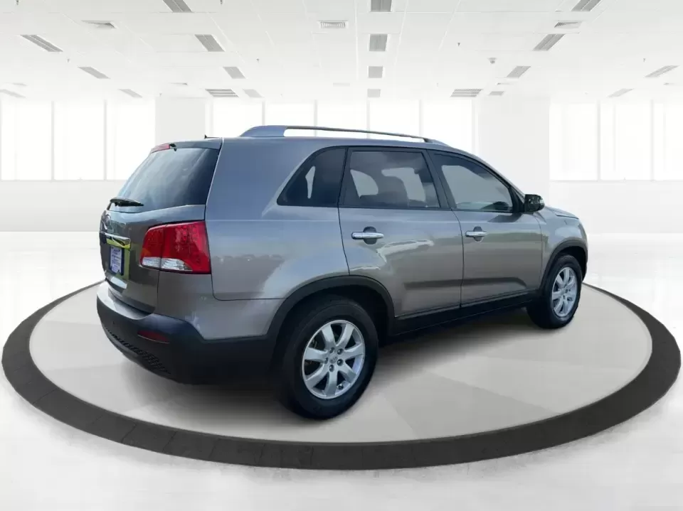 2012 Kia Sorento LX (5XYKT3A64CG) with an 2.4L I-4 gasoline direct injection engine, 6-Speed Automatic transmission, located at 401 Woodman Dr, Riverside, OH, 45431, (937) 908-9800, 39.760899, -84.123421 - Picture your next week going smoother: school drop-offs, the daily commute, grocery runs, and a last-minute weekend road trip-all in one comfortable SUV that fits real life without feeling like a compromise. This 2012 Kia Sorento LX in Satin Metal is the kind of practical, do-it-all sport utility th - Photo#2