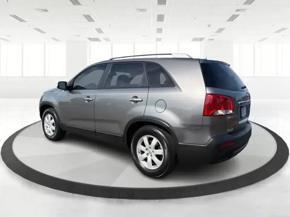 2012 Kia Sorento LX (5XYKT3A64CG) with an 2.4L I-4 gasoline direct injection engine, 6-Speed Automatic transmission, located at 401 Woodman Dr, Riverside, OH, 45431, (937) 908-9800, 39.760899, -84.123421 - Picture your next week going smoother: school drop-offs, the daily commute, grocery runs, and a last-minute weekend road trip-all in one comfortable SUV that fits real life without feeling like a compromise. This 2012 Kia Sorento LX in Satin Metal is the kind of practical, do-it-all sport utility th - Photo#4