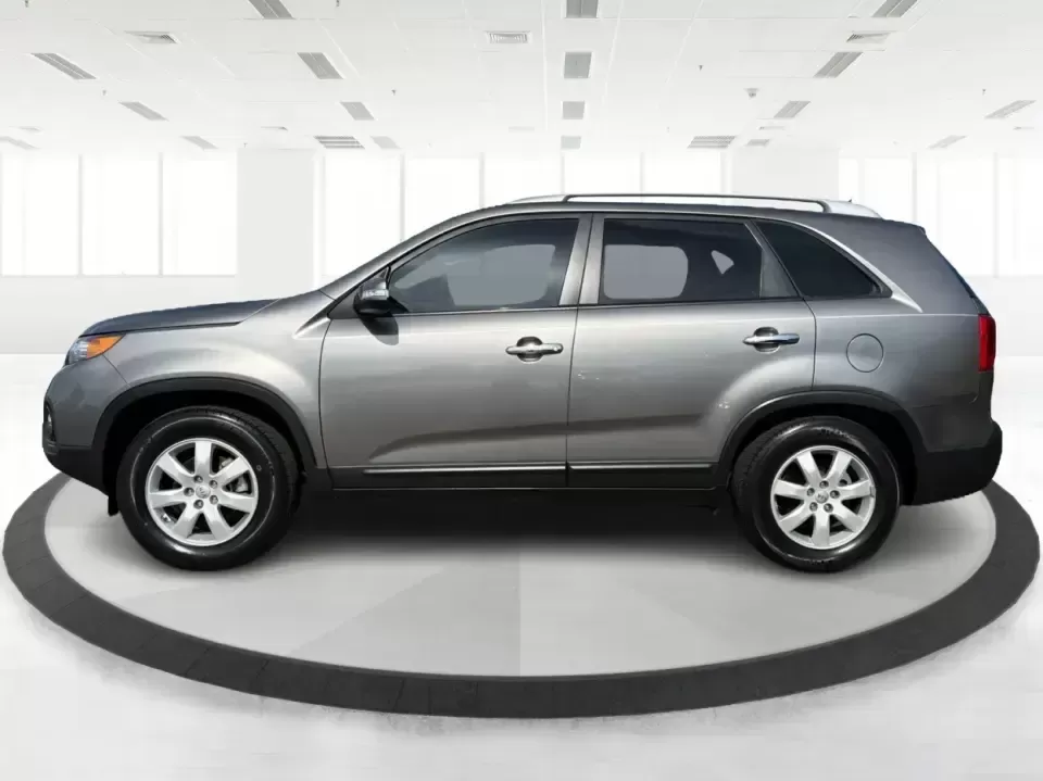 2012 Kia Sorento LX (5XYKT3A64CG) with an 2.4L I-4 gasoline direct injection engine, 6-Speed Automatic transmission, located at 401 Woodman Dr, Riverside, OH, 45431, (937) 908-9800, 39.760899, -84.123421 - Picture your next week going smoother: school drop-offs, the daily commute, grocery runs, and a last-minute weekend road trip-all in one comfortable SUV that fits real life without feeling like a compromise. This 2012 Kia Sorento LX in Satin Metal is the kind of practical, do-it-all sport utility th - Photo#5