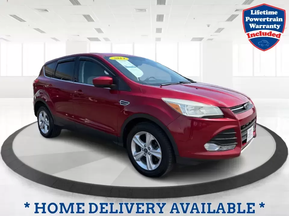 2014 Ford Escape SE (1FMCU9G9XEU) with an 2.0L L4 DOHC 16V engine, 6-Speed Automatic transmission, located at 4508 South Dixie Dr, Moraine, OH, 45439, (937) 908-9800, 39.689976, -84.218452 - Picture your next Ohio weekend: the kids loaded up for a day at Carillon Historical Park, a cooler in back for a picnic at Cox Arboretum, or a quick escape down I75 for a last-minute road trip-without worrying about whether your SUV can handle rain, slush, or a fully packed cargo area. This 2014 For - Photo#0