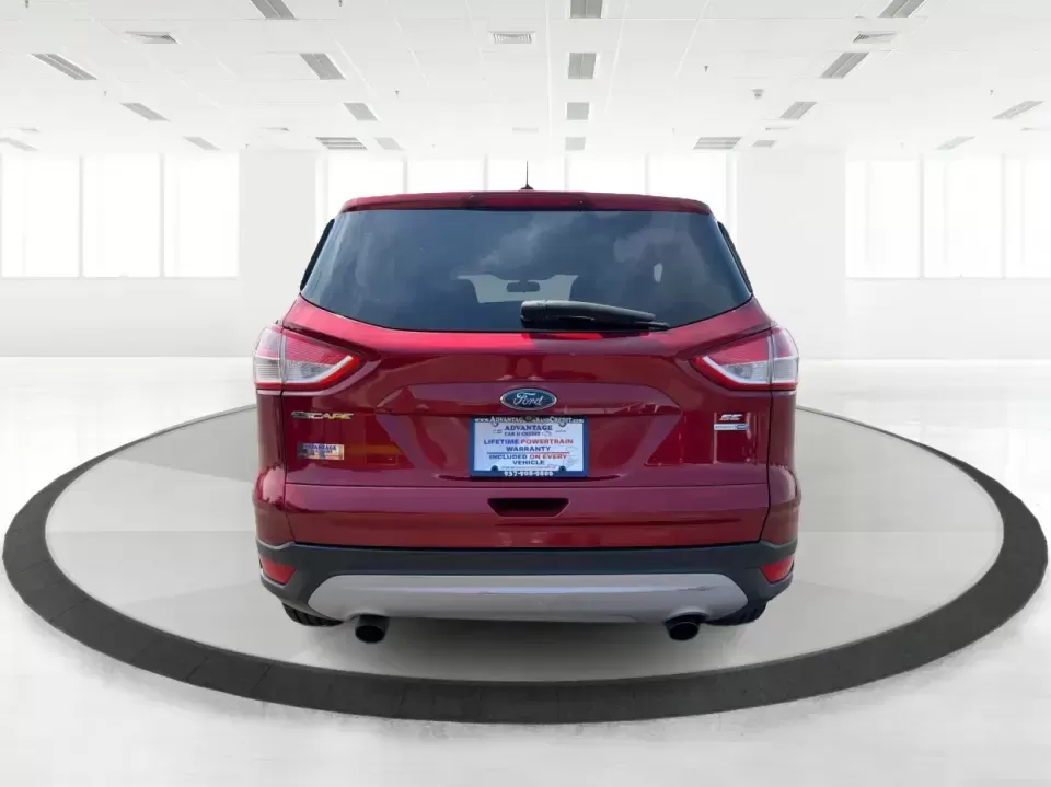 2014 Ford Escape SE (1FMCU9G9XEU) with an 2.0L L4 DOHC 16V engine, 6-Speed Automatic transmission, located at 4508 South Dixie Dr, Moraine, OH, 45439, (937) 908-9800, 39.689976, -84.218452 - Picture your next Ohio weekend: the kids loaded up for a day at Carillon Historical Park, a cooler in back for a picnic at Cox Arboretum, or a quick escape down I75 for a last-minute road trip-without worrying about whether your SUV can handle rain, slush, or a fully packed cargo area. This 2014 For - Photo#3