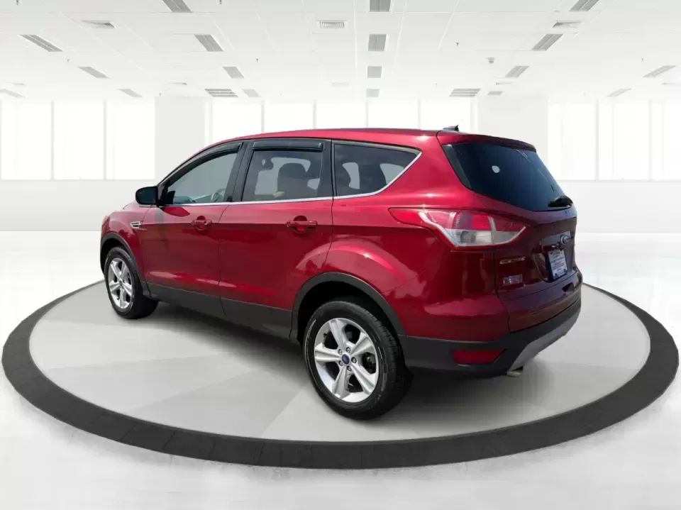 2014 Ford Escape SE (1FMCU9G9XEU) with an 2.0L L4 DOHC 16V engine, 6-Speed Automatic transmission, located at 4508 South Dixie Dr, Moraine, OH, 45439, (937) 908-9800, 39.689976, -84.218452 - Picture your next Ohio weekend: the kids loaded up for a day at Carillon Historical Park, a cooler in back for a picnic at Cox Arboretum, or a quick escape down I75 for a last-minute road trip-without worrying about whether your SUV can handle rain, slush, or a fully packed cargo area. This 2014 For - Photo#4