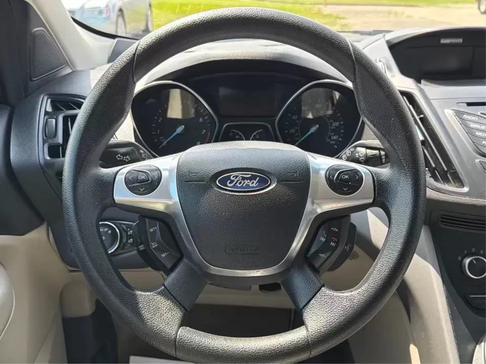 2014 Ford Escape SE (1FMCU9G9XEU) with an 2.0L L4 DOHC 16V engine, 6-Speed Automatic transmission, located at 4508 South Dixie Dr, Moraine, OH, 45439, (937) 908-9800, 39.689976, -84.218452 - Picture your next Ohio weekend: the kids loaded up for a day at Carillon Historical Park, a cooler in back for a picnic at Cox Arboretum, or a quick escape down I75 for a last-minute road trip-without worrying about whether your SUV can handle rain, slush, or a fully packed cargo area. This 2014 For - Photo#16