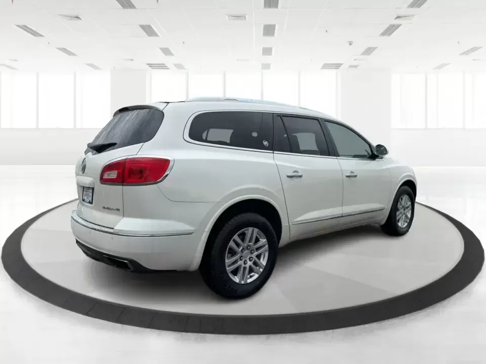 2015 Buick Enclave Convenience (5GAKRAKD6FJ) with an 3.6L V-6 gasoline direct injection engine, 6-Speed Automatic Overdrive transmission, located at 1184 Kauffman Ave, Fairborn, OH, 45324, (937) 908-9800, 39.807072, -84.030914 - Road-trip weekends, school drop-offs, and stress-free grocery runs get a whole lot easier in a 3-row SUV that's built to keep everyone comfortable. This **2015 Buick Enclave Convenience** in **White Opal** is a smart pick for **growing families**, **busy commuters**, and **budget-conscious buyers** - Photo#2