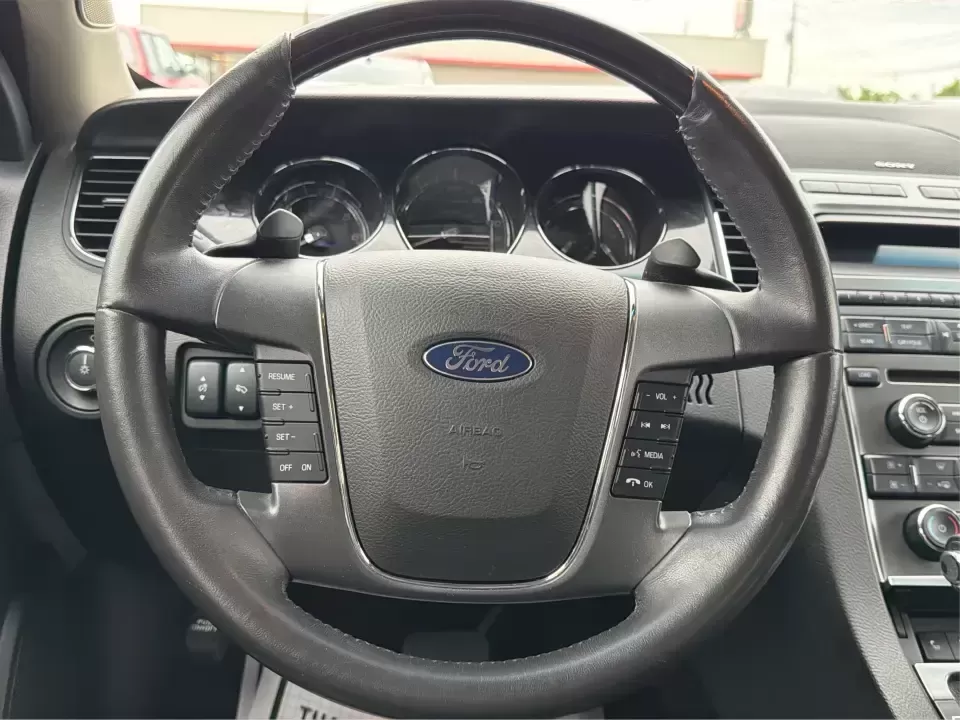 2012 Ford Taurus Limited (1FAHP2FW7CG) with an Duratec 3.5L V-6 DOHC engine, 6-Speed Automatic transmission, located at 401 Woodman Dr, Riverside, OH, 45431, (937) 908-9800, 39.760899, -84.123421 - Need a comfortable, confidence-inspiring sedan for long commutes down I-675, quick errands near The Greene, or smooth weekend drives to Downtown Dayton? This 2012 Ford Taurus Limited is built for real life-quiet, spacious, and loaded with premium features that make every mile feel easier, whether yo - Photo#16