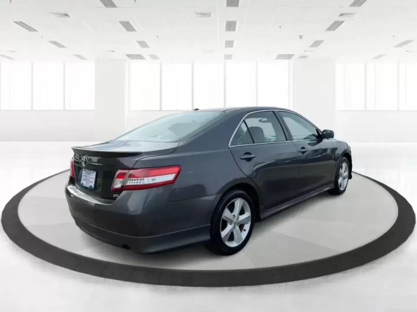 2011 Toyota Camry SE V6 (4T1BK3EK9BU) with an 3.5L V-6 DOHC engine, 6-Speed Automatic transmission, located at 4508 South Dixie Dr, Moraine, OH, 45439, (937) 908-9800, 39.689976, -84.218452 - Need a commuter that can eat up I75 miles all week, then still feel sporty for a Saturday drive past the Great Miami River or out toward the Miami Valley? This 2011 Toyota Camry SE V6 is the kind of practical-yet-fun sedan that fits real life in Piqua-reliable for work runs, comfortable for family e - Photo#2