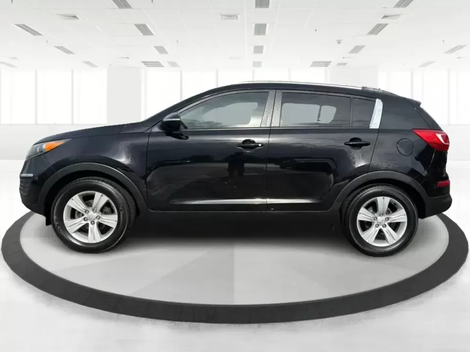 2011 Kia Sportage LX (KNDPB3A25B7) with an 2.4L I-4 DOHC engine, located at 1099 N County Rd 25A , Troy, OH, 45373, (937) 908-9800, 40.057079, -84.212883 - Weekend plans, school drop-offs, and the daily commute all get easier when you have a compact SUV that's comfortable, versatile, and ready for Ohio weather. This 2011 Kia Sportage LX is the kind of crossover that fits real life in Troy-whether you're loading up groceries after a run through town, me - Photo#5