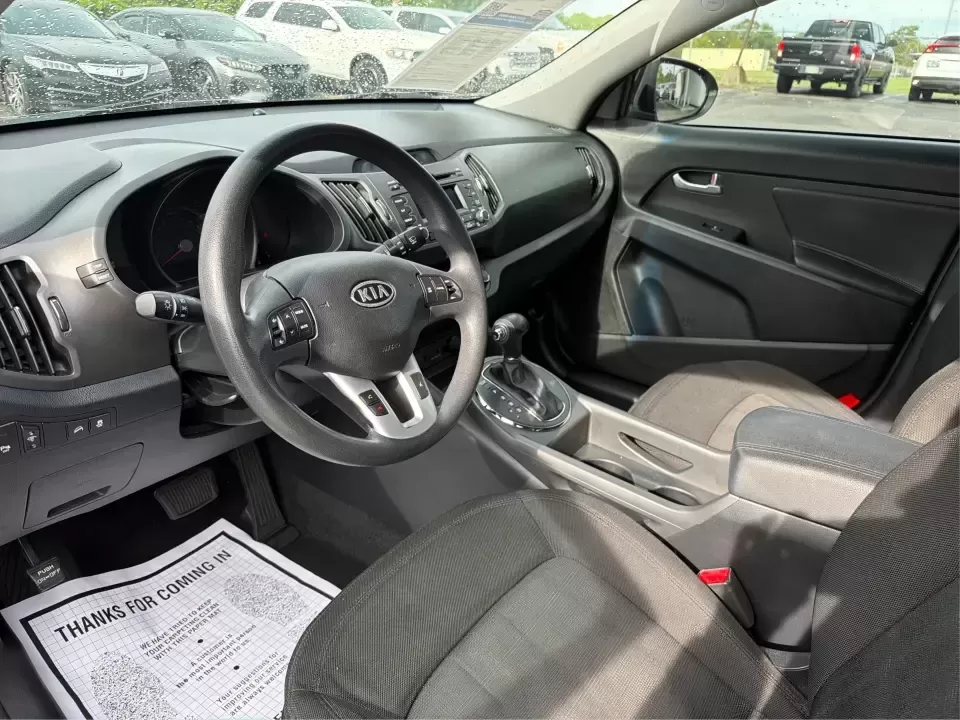 2011 Kia Sportage LX (KNDPB3A25B7) with an 2.4L I-4 DOHC engine, located at 1099 N County Rd 25A , Troy, OH, 45373, (937) 908-9800, 40.057079, -84.212883 - Weekend plans, school drop-offs, and the daily commute all get easier when you have a compact SUV that's comfortable, versatile, and ready for Ohio weather. This 2011 Kia Sportage LX is the kind of crossover that fits real life in Troy-whether you're loading up groceries after a run through town, me - Photo#9