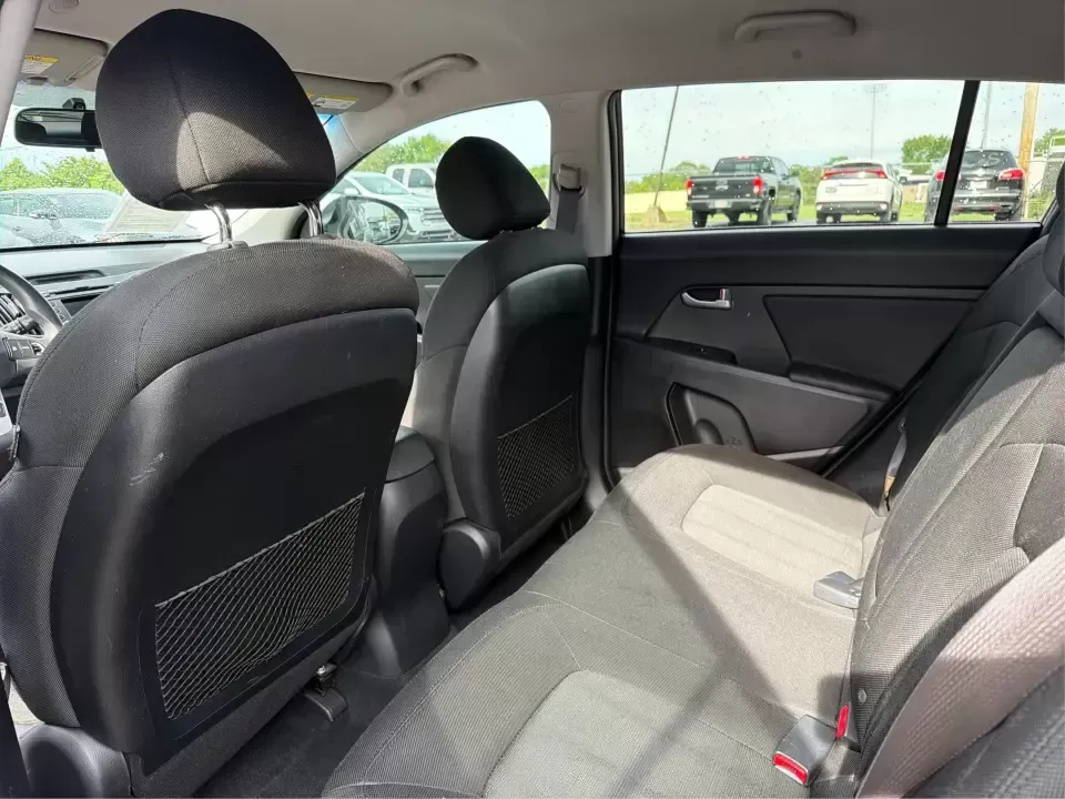 2011 Kia Sportage LX (KNDPB3A25B7) with an 2.4L I-4 DOHC engine, located at 1099 N County Rd 25A , Troy, OH, 45373, (937) 908-9800, 40.057079, -84.212883 - Weekend plans, school drop-offs, and the daily commute all get easier when you have a compact SUV that's comfortable, versatile, and ready for Ohio weather. This 2011 Kia Sportage LX is the kind of crossover that fits real life in Troy-whether you're loading up groceries after a run through town, me - Photo#10