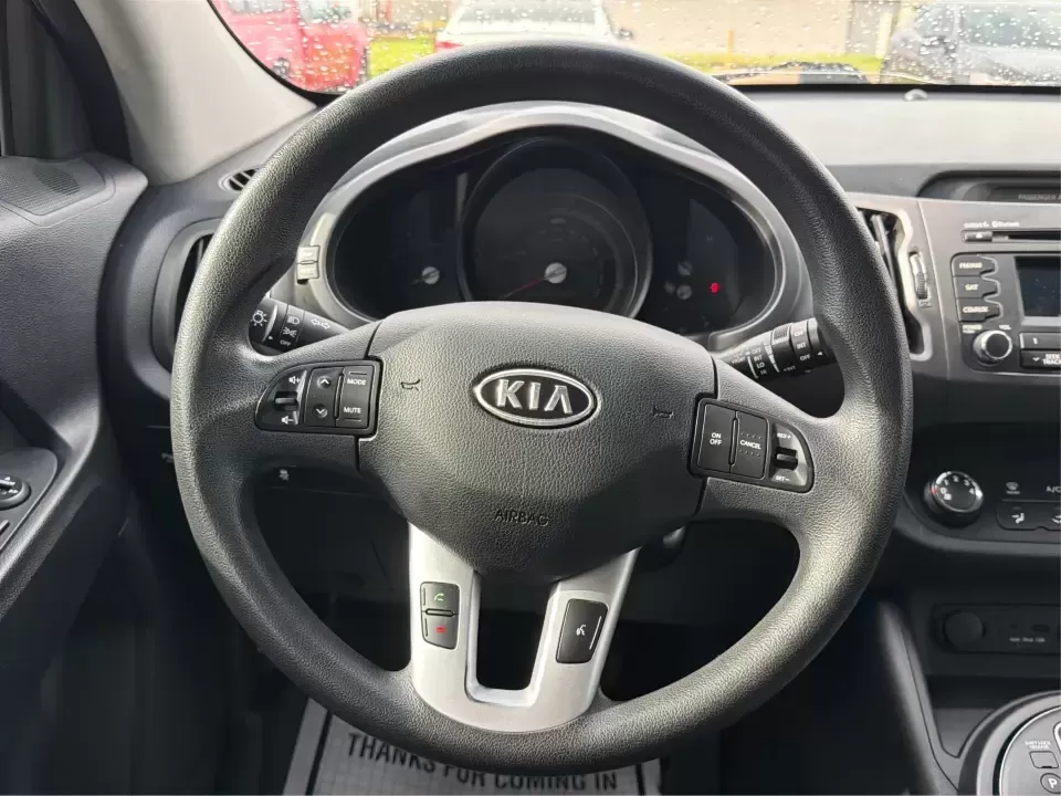 2011 Kia Sportage LX (KNDPB3A25B7) with an 2.4L I-4 DOHC engine, located at 1099 N County Rd 25A , Troy, OH, 45373, (937) 908-9800, 40.057079, -84.212883 - Weekend plans, school drop-offs, and the daily commute all get easier when you have a compact SUV that's comfortable, versatile, and ready for Ohio weather. This 2011 Kia Sportage LX is the kind of crossover that fits real life in Troy-whether you're loading up groceries after a run through town, me - Photo#16