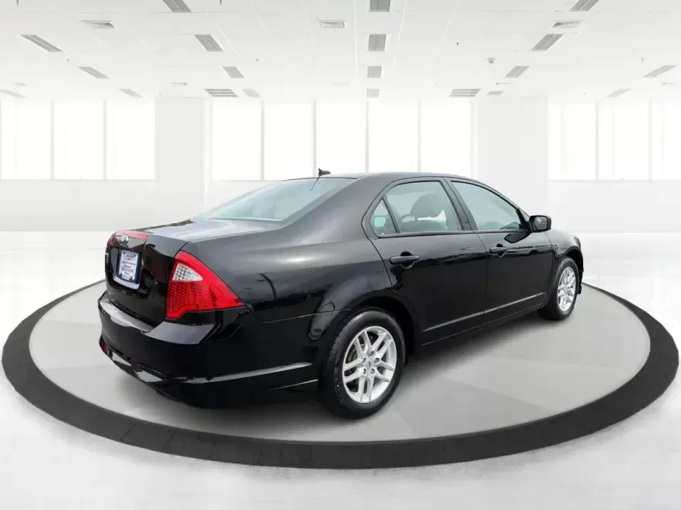 2012 Ford Fusion S (3FAHP0GA3CR) with an 2.5L I-4 DOHC engine, located at 1099 N County Rd 25A , Troy, OH, 45373, (937) 908-9800, 40.057079, -84.212883 - Need a dependable, budget-friendly sedan that can handle the weekday grind and still feel comfortable for weekend errands or a quick road trip to Dayton? This 2012 Ford Fusion S in sleek Tuxedo Black is a smart pick for commuters, first-time buyers, and growing families who want practical transporta - Photo#2