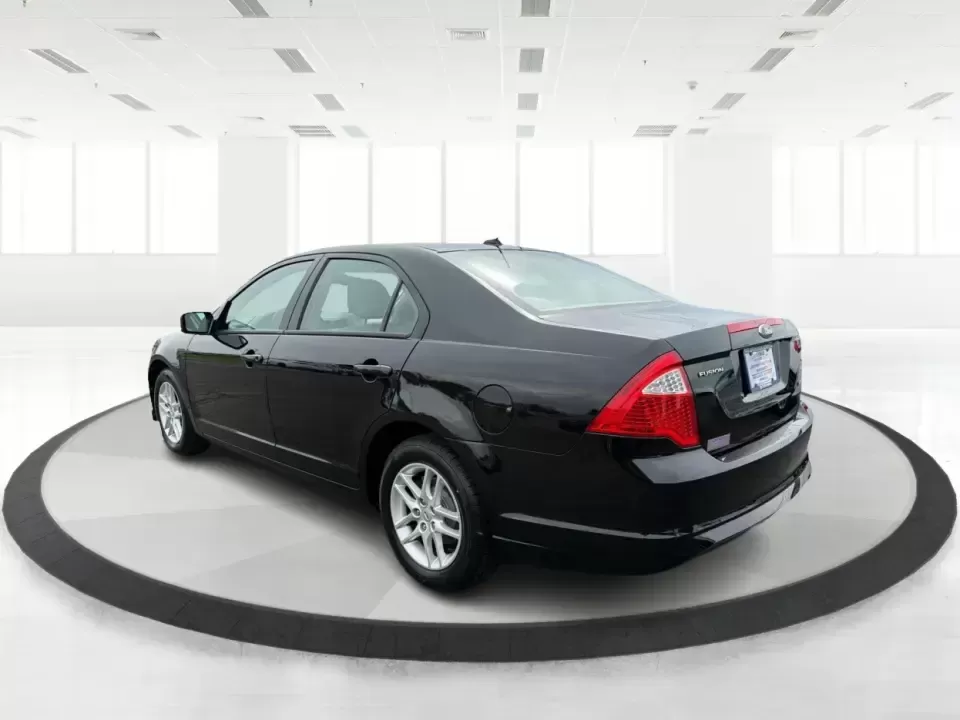 2012 Ford Fusion S (3FAHP0GA3CR) with an 2.5L I-4 DOHC engine, located at 1099 N County Rd 25A , Troy, OH, 45373, (937) 908-9800, 40.057079, -84.212883 - Need a dependable, budget-friendly sedan that can handle the weekday grind and still feel comfortable for weekend errands or a quick road trip to Dayton? This 2012 Ford Fusion S in sleek Tuxedo Black is a smart pick for commuters, first-time buyers, and growing families who want practical transporta - Photo#4