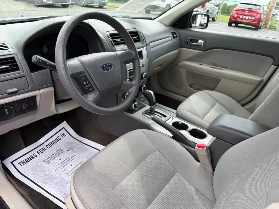 2012 Ford Fusion S (3FAHP0GA3CR) with an 2.5L I-4 DOHC engine, located at 1099 N County Rd 25A , Troy, OH, 45373, (937) 908-9800, 40.057079, -84.212883 - Need a dependable, budget-friendly sedan that can handle the weekday grind and still feel comfortable for weekend errands or a quick road trip to Dayton? This 2012 Ford Fusion S in sleek Tuxedo Black is a smart pick for commuters, first-time buyers, and growing families who want practical transporta - Photo#9