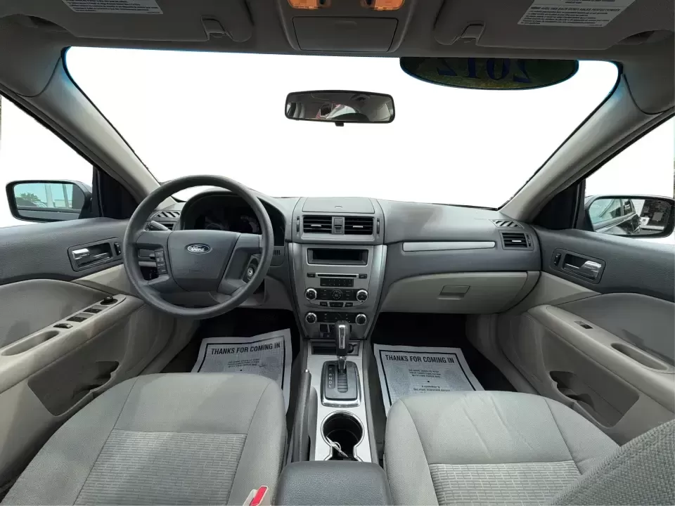2012 Ford Fusion S (3FAHP0GA3CR) with an 2.5L I-4 DOHC engine, located at 1099 N County Rd 25A , Troy, OH, 45373, (937) 908-9800, 40.057079, -84.212883 - Need a dependable, budget-friendly sedan that can handle the weekday grind and still feel comfortable for weekend errands or a quick road trip to Dayton? This 2012 Ford Fusion S in sleek Tuxedo Black is a smart pick for commuters, first-time buyers, and growing families who want practical transporta - Photo#21