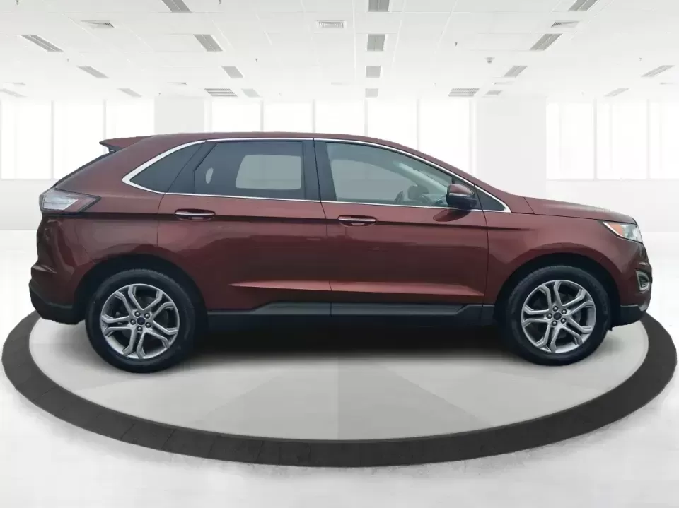 2016 Ford Edge Titanium (2FMPK3K91GB) with an 2.0L L4 DOHC 16V engine, 6A transmission, located at 4508 South Dixie Dr, Moraine, OH, 45439, (937) 908-9800, 39.689976, -84.218452 - Picture your next Ohio weekend: loading up groceries for the week in Moraine, grabbing coffee off South Dixie Drive, then cruising I-75 toward Dayton's Riverscape MetroPark or a quick family road trip to Carillon Historical Park-without feeling cramped, stressed, or under-equipped. This **2016 Ford - Photo#1