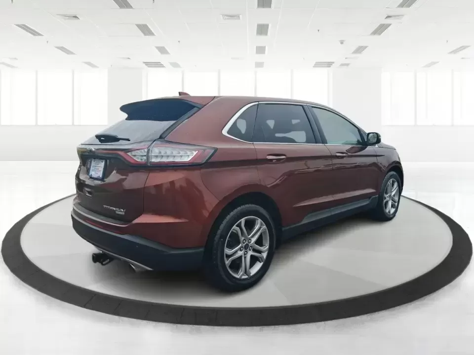 2016 Ford Edge Titanium (2FMPK3K91GB) with an 2.0L L4 DOHC 16V engine, 6A transmission, located at 4508 South Dixie Dr, Moraine, OH, 45439, (937) 908-9800, 39.689976, -84.218452 - Picture your next Ohio weekend: loading up groceries for the week in Moraine, grabbing coffee off South Dixie Drive, then cruising I-75 toward Dayton's Riverscape MetroPark or a quick family road trip to Carillon Historical Park-without feeling cramped, stressed, or under-equipped. This **2016 Ford - Photo#2