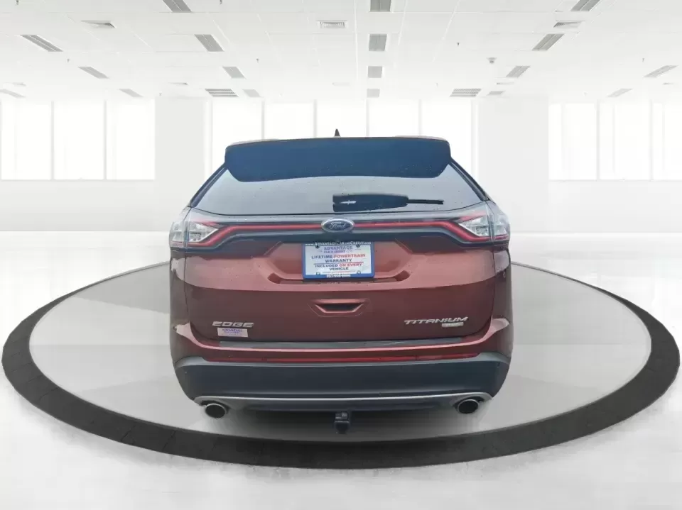 2016 Ford Edge Titanium (2FMPK3K91GB) with an 2.0L L4 DOHC 16V engine, 6A transmission, located at 4508 South Dixie Dr, Moraine, OH, 45439, (937) 908-9800, 39.689976, -84.218452 - Picture your next Ohio weekend: loading up groceries for the week in Moraine, grabbing coffee off South Dixie Drive, then cruising I-75 toward Dayton's Riverscape MetroPark or a quick family road trip to Carillon Historical Park-without feeling cramped, stressed, or under-equipped. This **2016 Ford - Photo#3