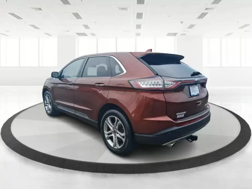 2016 Ford Edge Titanium (2FMPK3K91GB) with an 2.0L L4 DOHC 16V engine, 6A transmission, located at 4508 South Dixie Dr, Moraine, OH, 45439, (937) 908-9800, 39.689976, -84.218452 - Picture your next Ohio weekend: loading up groceries for the week in Moraine, grabbing coffee off South Dixie Drive, then cruising I-75 toward Dayton's Riverscape MetroPark or a quick family road trip to Carillon Historical Park-without feeling cramped, stressed, or under-equipped. This **2016 Ford - Photo#4