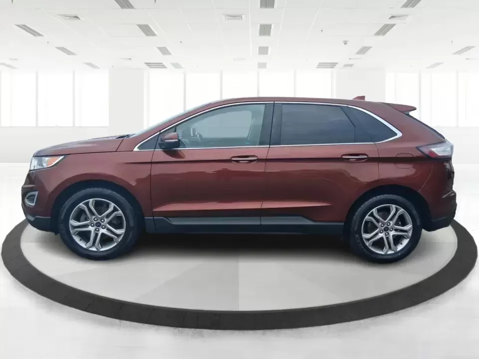 2016 Ford Edge Titanium (2FMPK3K91GB) with an 2.0L L4 DOHC 16V engine, 6A transmission, located at 4508 South Dixie Dr, Moraine, OH, 45439, (937) 908-9800, 39.689976, -84.218452 - Picture your next Ohio weekend: loading up groceries for the week in Moraine, grabbing coffee off South Dixie Drive, then cruising I-75 toward Dayton's Riverscape MetroPark or a quick family road trip to Carillon Historical Park-without feeling cramped, stressed, or under-equipped. This **2016 Ford - Photo#5