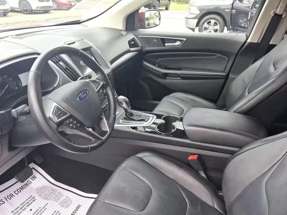 2016 Ford Edge Titanium (2FMPK3K91GB) with an 2.0L L4 DOHC 16V engine, 6A transmission, located at 4508 South Dixie Dr, Moraine, OH, 45439, (937) 908-9800, 39.689976, -84.218452 - Picture your next Ohio weekend: loading up groceries for the week in Moraine, grabbing coffee off South Dixie Drive, then cruising I-75 toward Dayton's Riverscape MetroPark or a quick family road trip to Carillon Historical Park-without feeling cramped, stressed, or under-equipped. This **2016 Ford - Photo#9