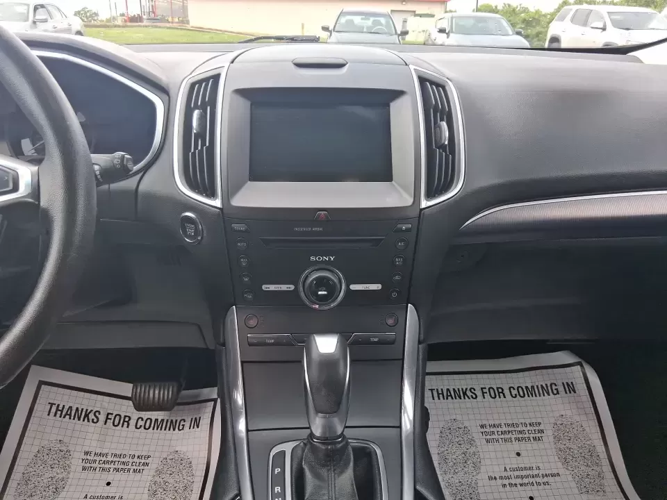 2016 Ford Edge Titanium (2FMPK3K91GB) with an 2.0L L4 DOHC 16V engine, 6A transmission, located at 4508 South Dixie Dr, Moraine, OH, 45439, (937) 908-9800, 39.689976, -84.218452 - Picture your next Ohio weekend: loading up groceries for the week in Moraine, grabbing coffee off South Dixie Drive, then cruising I-75 toward Dayton's Riverscape MetroPark or a quick family road trip to Carillon Historical Park-without feeling cramped, stressed, or under-equipped. This **2016 Ford - Photo#14