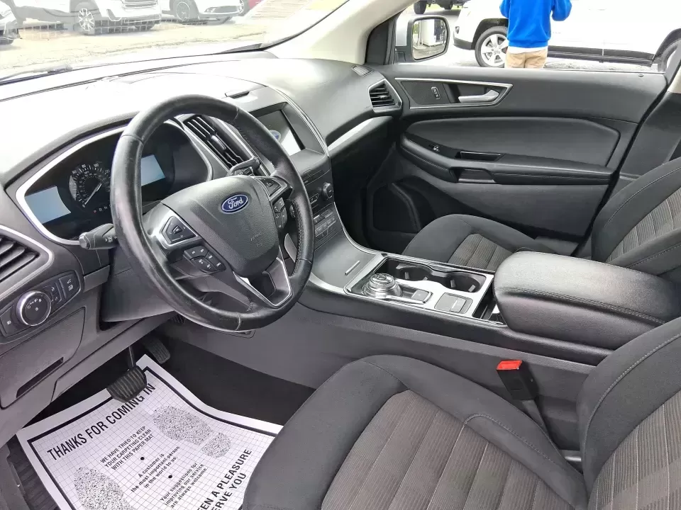 2019 Ford Edge SEL (2FMPK4J98KB) with an EcoBoost 2L I-4 gasoline direct injection engine, 6A transmission, located at 8750 N County Rd 25A, Piqua, OH, 45356, (937) 908-9800, 40.164391, -84.232513 - Picture your next road trip up I75, a week of school drop-offs, or a snowy Ohio commute that still feels calm and comfortable-this 2019 Ford Edge SEL AWD is built for real life. With confident all-wheel drive and a practical SUV layout, it's a smart fit for growing families, busy professionals, and - Photo#9