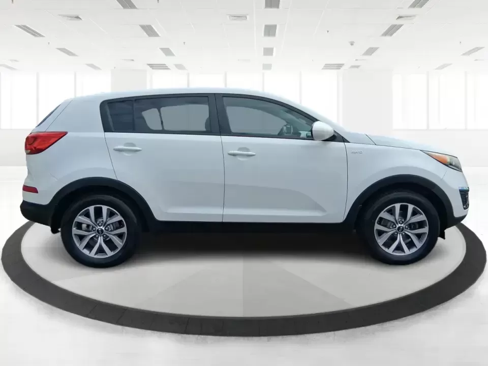2015 Kia Sportage LX (KNDPBCAC2F7) with an 2.4L V6 DOHC 24V engine, 6-Speed Automatic transmission, located at 1184 Kauffman Ave, Fairborn, OH, 45324, (937) 908-9800, 39.807072, -84.030914 - Ready for weekend getaways at Caesar Creek, snowy commutes up I675, or everyday school-and-grocery runs around Fairborn and Beavercreek, this 2015 Kia Sportage LX is the kind of practical crossover that fits real life. With confident AWD/4WD capability, a comfortable cabin, and versatile cargo space - Photo#1