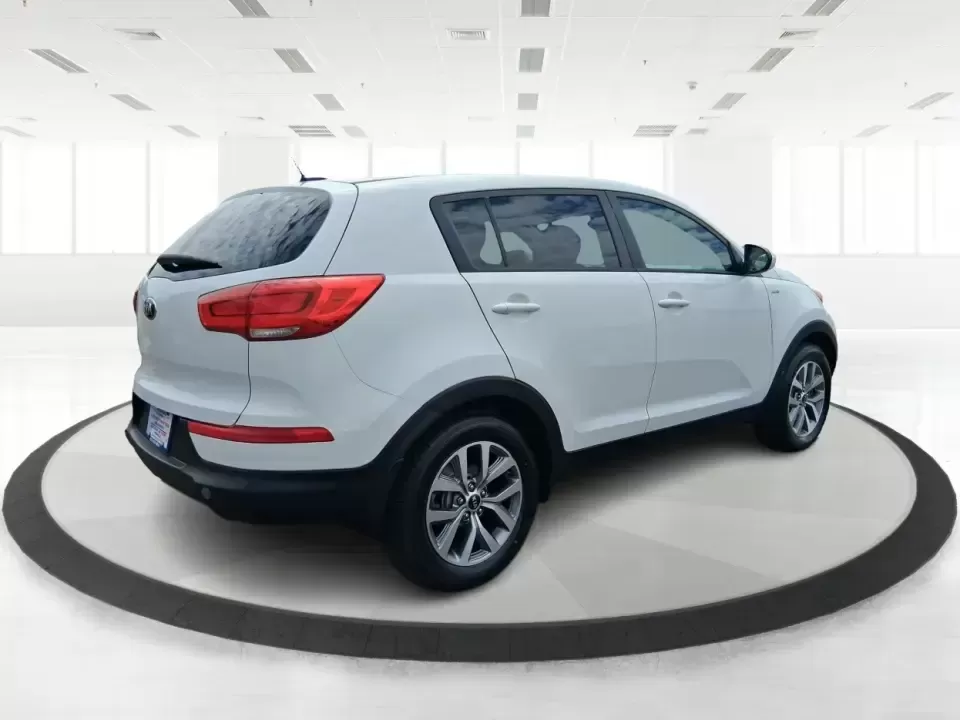 2015 Kia Sportage LX (KNDPBCAC2F7) with an 2.4L V6 DOHC 24V engine, 6-Speed Automatic transmission, located at 1184 Kauffman Ave, Fairborn, OH, 45324, (937) 908-9800, 39.807072, -84.030914 - Ready for weekend getaways at Caesar Creek, snowy commutes up I675, or everyday school-and-grocery runs around Fairborn and Beavercreek, this 2015 Kia Sportage LX is the kind of practical crossover that fits real life. With confident AWD/4WD capability, a comfortable cabin, and versatile cargo space - Photo#2