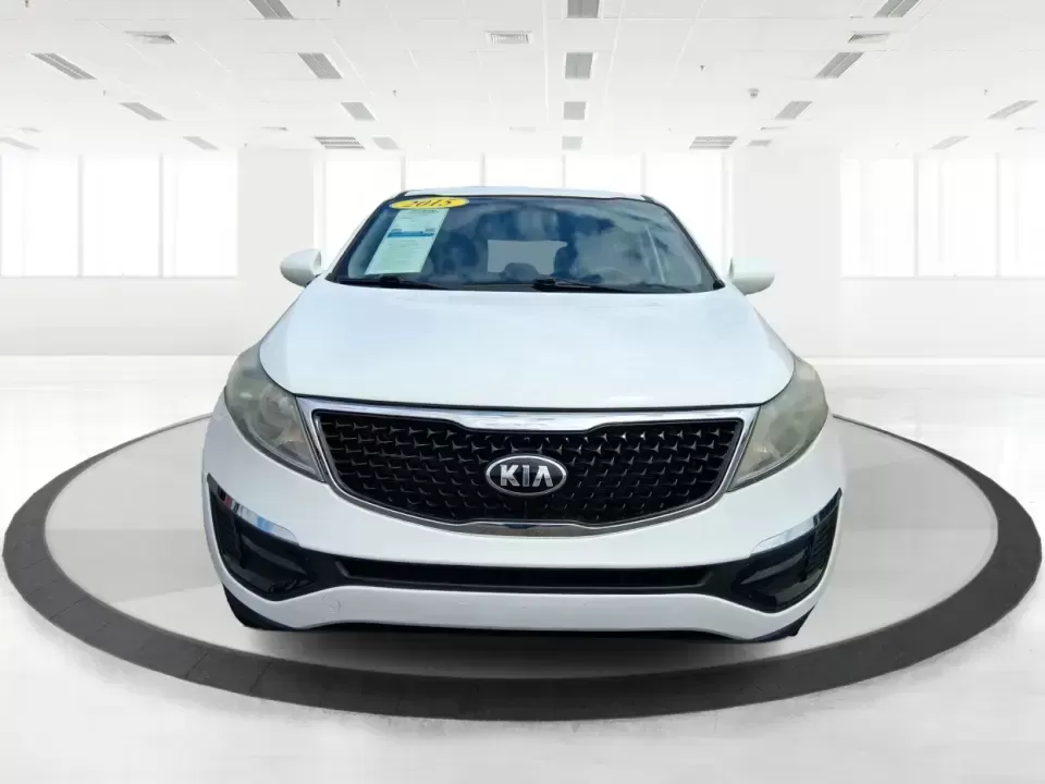 2015 Kia Sportage LX (KNDPBCAC2F7) with an 2.4L V6 DOHC 24V engine, 6-Speed Automatic transmission, located at 1184 Kauffman Ave, Fairborn, OH, 45324, (937) 908-9800, 39.807072, -84.030914 - Ready for weekend getaways at Caesar Creek, snowy commutes up I675, or everyday school-and-grocery runs around Fairborn and Beavercreek, this 2015 Kia Sportage LX is the kind of practical crossover that fits real life. With confident AWD/4WD capability, a comfortable cabin, and versatile cargo space - Photo#7