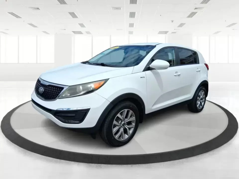 2015 Kia Sportage LX (KNDPBCAC2F7) with an 2.4L V6 DOHC 24V engine, 6-Speed Automatic transmission, located at 1184 Kauffman Ave, Fairborn, OH, 45324, (937) 908-9800, 39.807072, -84.030914 - Ready for weekend getaways at Caesar Creek, snowy commutes up I675, or everyday school-and-grocery runs around Fairborn and Beavercreek, this 2015 Kia Sportage LX is the kind of practical crossover that fits real life. With confident AWD/4WD capability, a comfortable cabin, and versatile cargo space - Photo#8