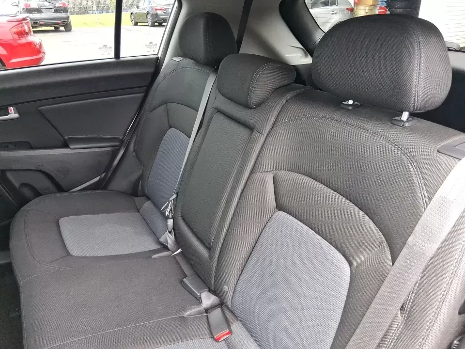 2015 Kia Sportage LX (KNDPBCAC2F7) with an 2.4L V6 DOHC 24V engine, 6-Speed Automatic transmission, located at 1184 Kauffman Ave, Fairborn, OH, 45324, (937) 908-9800, 39.807072, -84.030914 - Ready for weekend getaways at Caesar Creek, snowy commutes up I675, or everyday school-and-grocery runs around Fairborn and Beavercreek, this 2015 Kia Sportage LX is the kind of practical crossover that fits real life. With confident AWD/4WD capability, a comfortable cabin, and versatile cargo space - Photo#10