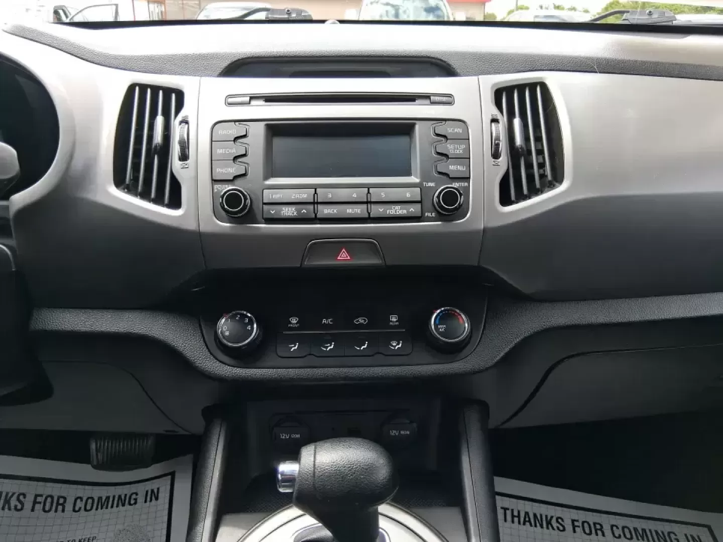 2015 Kia Sportage LX (KNDPBCAC2F7) with an 2.4L V6 DOHC 24V engine, 6-Speed Automatic transmission, located at 1184 Kauffman Ave, Fairborn, OH, 45324, (937) 908-9800, 39.807072, -84.030914 - Ready for weekend getaways at Caesar Creek, snowy commutes up I675, or everyday school-and-grocery runs around Fairborn and Beavercreek, this 2015 Kia Sportage LX is the kind of practical crossover that fits real life. With confident AWD/4WD capability, a comfortable cabin, and versatile cargo space - Photo#13
