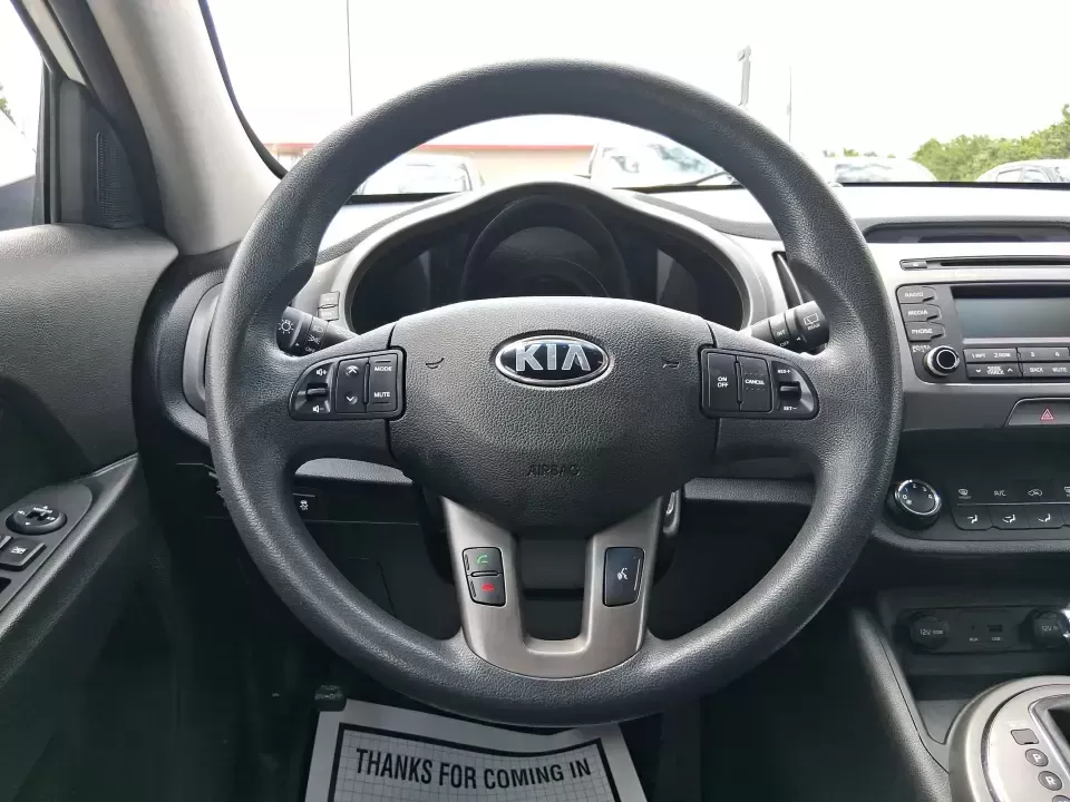 2015 Kia Sportage LX (KNDPBCAC2F7) with an 2.4L V6 DOHC 24V engine, 6-Speed Automatic transmission, located at 1184 Kauffman Ave, Fairborn, OH, 45324, (937) 908-9800, 39.807072, -84.030914 - Ready for weekend getaways at Caesar Creek, snowy commutes up I675, or everyday school-and-grocery runs around Fairborn and Beavercreek, this 2015 Kia Sportage LX is the kind of practical crossover that fits real life. With confident AWD/4WD capability, a comfortable cabin, and versatile cargo space - Photo#16