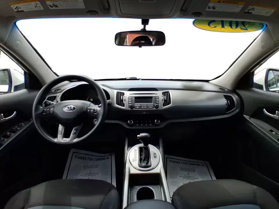 2015 Kia Sportage LX (KNDPBCAC2F7) with an 2.4L V6 DOHC 24V engine, 6-Speed Automatic transmission, located at 1184 Kauffman Ave, Fairborn, OH, 45324, (937) 908-9800, 39.807072, -84.030914 - Ready for weekend getaways at Caesar Creek, snowy commutes up I675, or everyday school-and-grocery runs around Fairborn and Beavercreek, this 2015 Kia Sportage LX is the kind of practical crossover that fits real life. With confident AWD/4WD capability, a comfortable cabin, and versatile cargo space - Photo#19