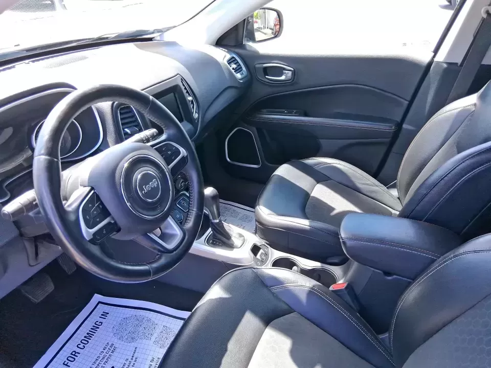 2018 Jeep Compass Latitude 4x4 (3C4NJDBB7JT) with an 2.4L L4 DOHC 16V engine, Manual/Standard transmission, located at 8750 N County Rd 25A, Piqua, OH, 45356, (937) 908-9800, 40.164391, -84.232513 - Weekend escapes, snowy school runs, and everyday commuting feel easier when your SUV is ready for whatever Ohio throws at it. This 2018 Jeep Compass Latitude 4x4 is built for drivers who want the flexibility to head from the weekday grind to a last-minute trip out toward Indian Lake or a scenic driv - Photo#9