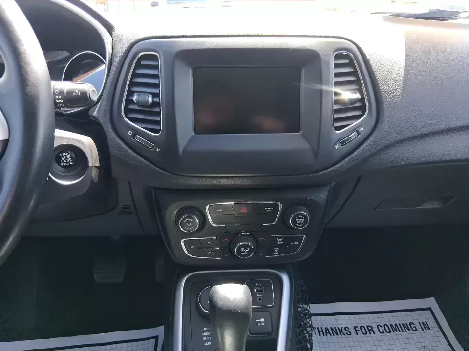 2018 Jeep Compass Latitude 4x4 (3C4NJDBB7JT) with an 2.4L L4 DOHC 16V engine, Manual/Standard transmission, located at 8750 N County Rd 25A, Piqua, OH, 45356, (937) 908-9800, 40.164391, -84.232513 - Weekend escapes, snowy school runs, and everyday commuting feel easier when your SUV is ready for whatever Ohio throws at it. This 2018 Jeep Compass Latitude 4x4 is built for drivers who want the flexibility to head from the weekday grind to a last-minute trip out toward Indian Lake or a scenic driv - Photo#13