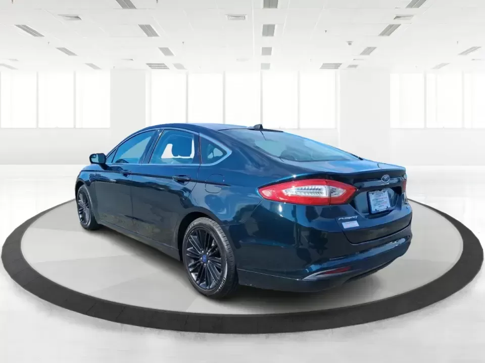 2014 Ford Fusion SE (3FA6P0HD8ER) with an 1.5L L4 DOHC 16V engine, located at 1230 East Main St, Xenia, OH, 45385, (937) 908-9800, 39.688026, -83.910172 - Need a dependable commuter that still feels comfortable for date night in Beavercreek, errands around Xenia Station, and weekend drives out toward Caesars Creek? This 2014 Ford Fusion SE is the kind of smart, budget-friendly sedan that fits real life-easy to park downtown, smooth on longer stretches - Photo#4