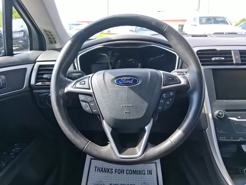 2014 Ford Fusion SE (3FA6P0HD8ER) with an 1.5L L4 DOHC 16V engine, located at 1230 East Main St, Xenia, OH, 45385, (937) 908-9800, 39.688026, -83.910172 - Need a dependable commuter that still feels comfortable for date night in Beavercreek, errands around Xenia Station, and weekend drives out toward Caesars Creek? This 2014 Ford Fusion SE is the kind of smart, budget-friendly sedan that fits real life-easy to park downtown, smooth on longer stretches - Photo#16