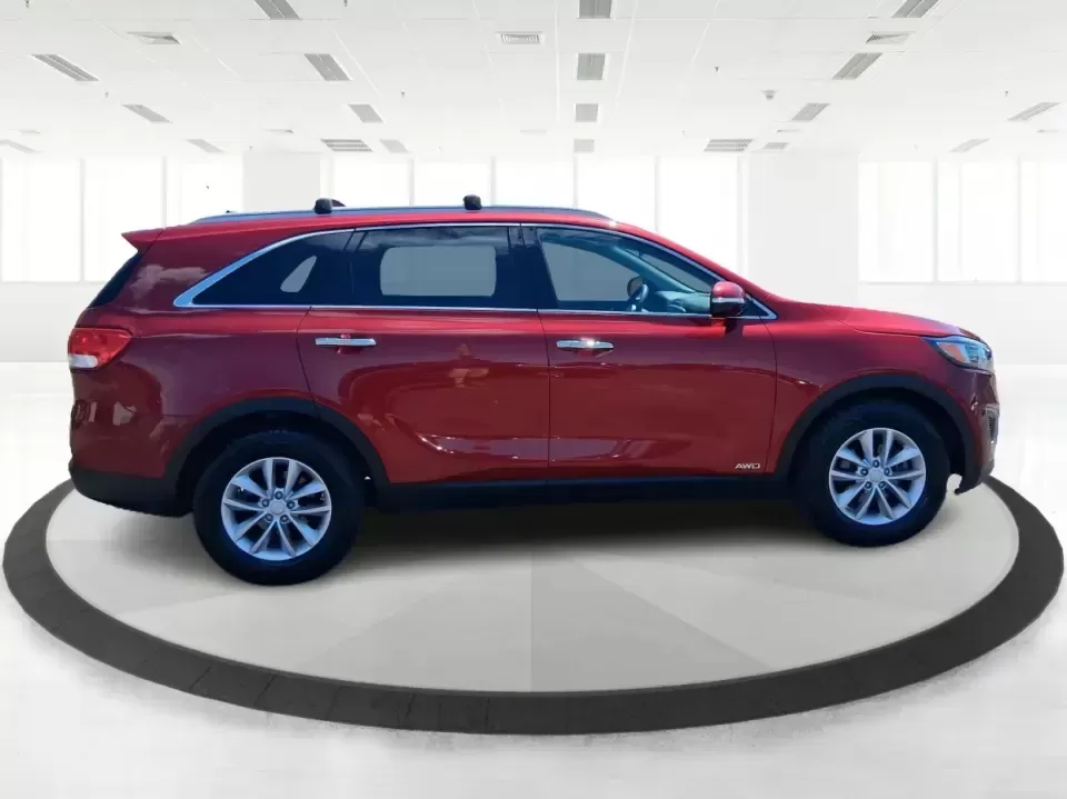 2017 Kia Sorento 2.4L LX (5XYPGDA37HG) with an 2.4L I-4 gasoline direct injection engine, 6A transmission, located at 8750 N County Rd 25A, Piqua, OH, 45356, (937) 908-9800, 40.164391, -84.232513 - Picture your next road trip out of Vandalia with room for the whole crew, the gear, and the groceries-without giving up everyday comfort. This **2017 Kia Sorento LX (2.4L)** in eye-catching **Remington Red** is the kind of SUV that fits real life: school drop-offs, long commutes to Dayton, weekend r - Photo#1