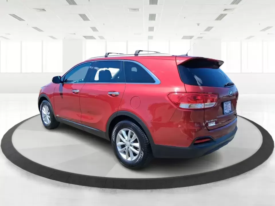 2017 Kia Sorento 2.4L LX (5XYPGDA37HG) with an 2.4L I-4 gasoline direct injection engine, 6A transmission, located at 8750 N County Rd 25A, Piqua, OH, 45356, (937) 908-9800, 40.164391, -84.232513 - Picture your next road trip out of Vandalia with room for the whole crew, the gear, and the groceries-without giving up everyday comfort. This **2017 Kia Sorento LX (2.4L)** in eye-catching **Remington Red** is the kind of SUV that fits real life: school drop-offs, long commutes to Dayton, weekend r - Photo#4