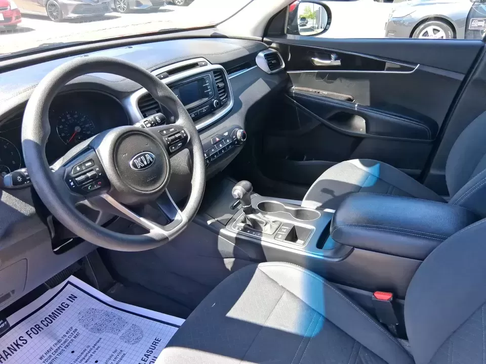 2017 Kia Sorento 2.4L LX (5XYPGDA37HG) with an 2.4L I-4 gasoline direct injection engine, 6A transmission, located at 8750 N County Rd 25A, Piqua, OH, 45356, (937) 908-9800, 40.164391, -84.232513 - Picture your next road trip out of Vandalia with room for the whole crew, the gear, and the groceries-without giving up everyday comfort. This **2017 Kia Sorento LX (2.4L)** in eye-catching **Remington Red** is the kind of SUV that fits real life: school drop-offs, long commutes to Dayton, weekend r - Photo#9