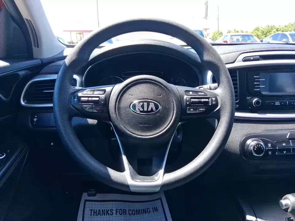 2017 Kia Sorento 2.4L LX (5XYPGDA37HG) with an 2.4L I-4 gasoline direct injection engine, 6A transmission, located at 8750 N County Rd 25A, Piqua, OH, 45356, (937) 908-9800, 40.164391, -84.232513 - Picture your next road trip out of Vandalia with room for the whole crew, the gear, and the groceries-without giving up everyday comfort. This **2017 Kia Sorento LX (2.4L)** in eye-catching **Remington Red** is the kind of SUV that fits real life: school drop-offs, long commutes to Dayton, weekend r - Photo#16