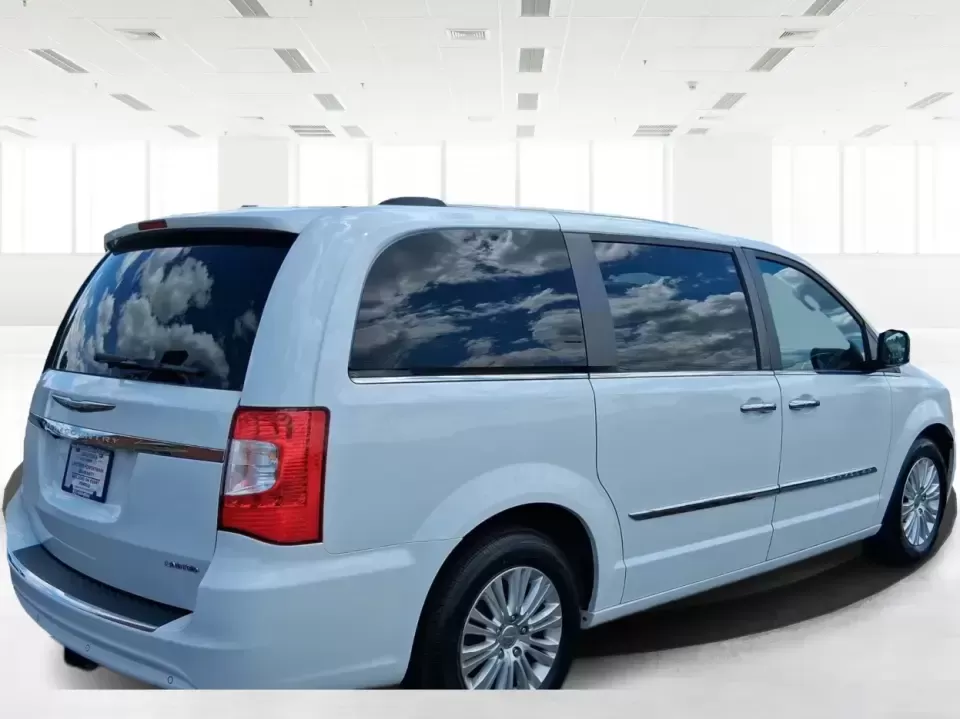2014 Chrysler Town and Country Limited (2C4RC1GGXER) with an Pentastar 3.6L V-6 DOHC engine, 6-Speed Automatic transmission, located at 4508 South Dixie Dr, Moraine, OH, 45439, (937) 908-9800, 39.689976, -84.218452 - Road-trip ready and family-approved, this 2014 Chrysler Town and Country Limited is the kind of minivan that fits real life in Moraine-school drop-offs, grocery runs, weekend tournaments, and those longer drives up I-75 or across town toward Dayton. Finished in Bright White Clearcoat, it blends a - Photo#1