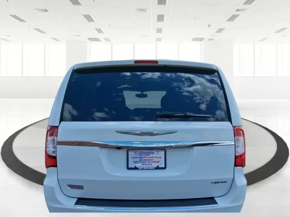 2014 Chrysler Town and Country Limited (2C4RC1GGXER) with an Pentastar 3.6L V-6 DOHC engine, 6-Speed Automatic transmission, located at 4508 South Dixie Dr, Moraine, OH, 45439, (937) 908-9800, 39.689976, -84.218452 - Road-trip ready and family-approved, this 2014 Chrysler Town and Country Limited is the kind of minivan that fits real life in Moraine-school drop-offs, grocery runs, weekend tournaments, and those longer drives up I-75 or across town toward Dayton. Finished in Bright White Clearcoat, it blends a - Photo#2