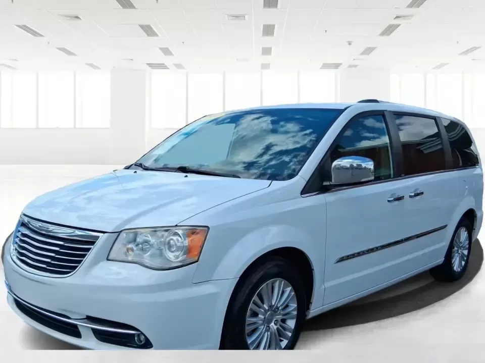 2014 Chrysler Town and Country Limited (2C4RC1GGXER) with an Pentastar 3.6L V-6 DOHC engine, 6-Speed Automatic transmission, located at 4508 South Dixie Dr, Moraine, OH, 45439, (937) 908-9800, 39.689976, -84.218452 - Road-trip ready and family-approved, this 2014 Chrysler Town and Country Limited is the kind of minivan that fits real life in Moraine-school drop-offs, grocery runs, weekend tournaments, and those longer drives up I-75 or across town toward Dayton. Finished in Bright White Clearcoat, it blends a - Photo#7