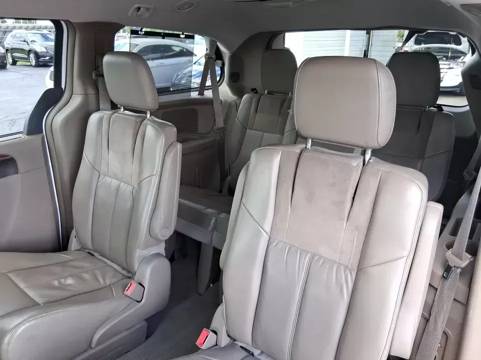 2014 Chrysler Town and Country Limited (2C4RC1GGXER) with an Pentastar 3.6L V-6 DOHC engine, 6-Speed Automatic transmission, located at 4508 South Dixie Dr, Moraine, OH, 45439, (937) 908-9800, 39.689976, -84.218452 - Road-trip ready and family-approved, this 2014 Chrysler Town and Country Limited is the kind of minivan that fits real life in Moraine-school drop-offs, grocery runs, weekend tournaments, and those longer drives up I-75 or across town toward Dayton. Finished in Bright White Clearcoat, it blends a - Photo#9